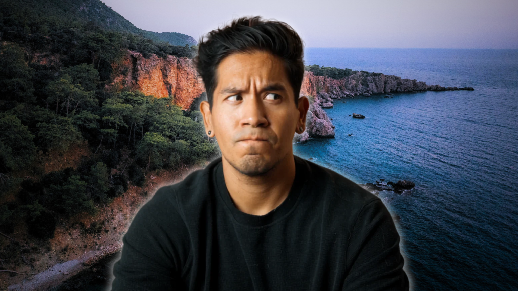 Edgar in front of a coastal landscape